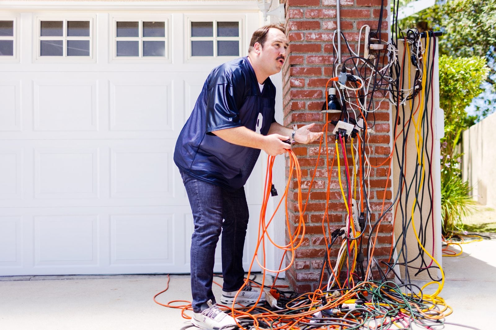 Northern Mister Sparky electrician diagnosing an overloaded circuit
